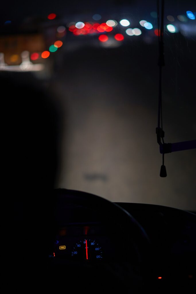 Nighttime Driving: Dimly Lit Dashboard Wallpaper Background