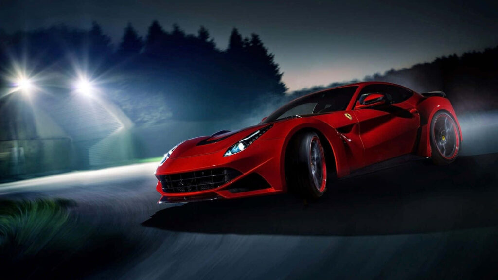 The Enthralling Nighttime Run: The Stunning Ferrari Model Gleaming in Dark Red - A Perfect Car Backdrop! Wallpaper