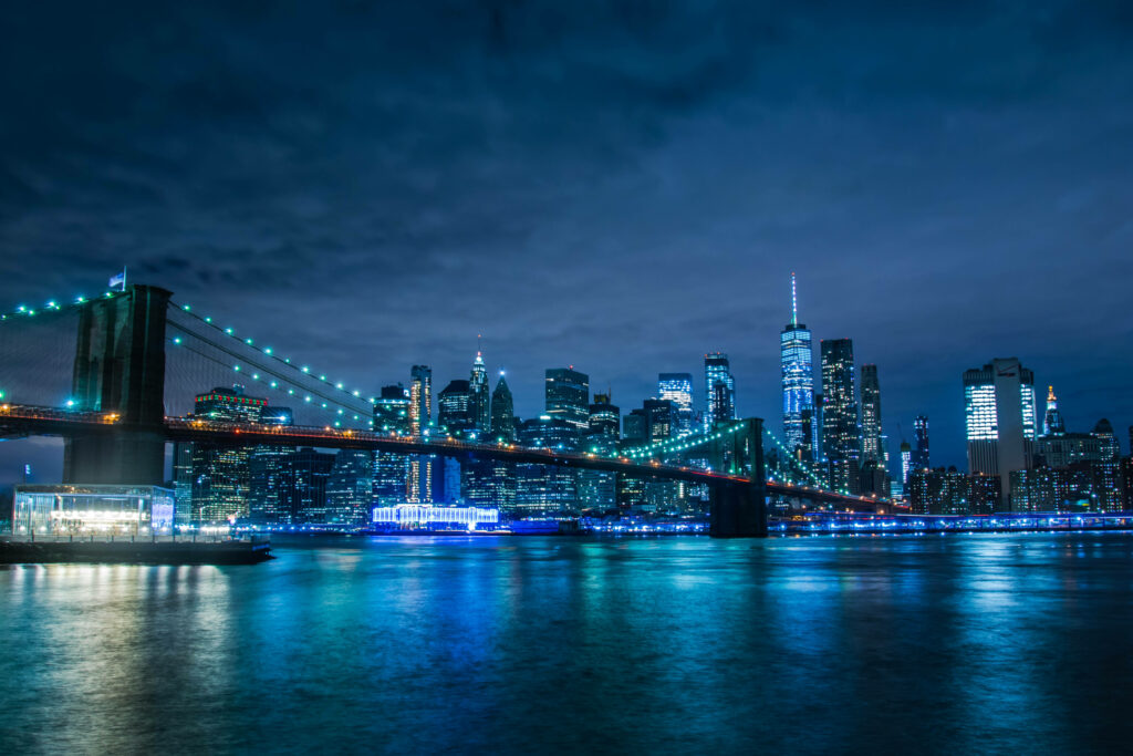 Mesmerizing Nighttime Cityscape Reflected on Calm Waters - Perfect 4K HD Laptop Wallpaper