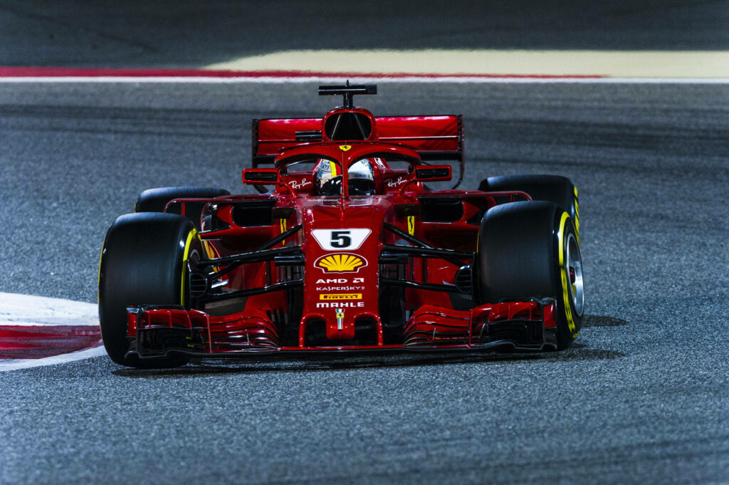 Speed Demon: A Mesmerizing Midnight Display of the Ferrari F1 2018 Wallpaper