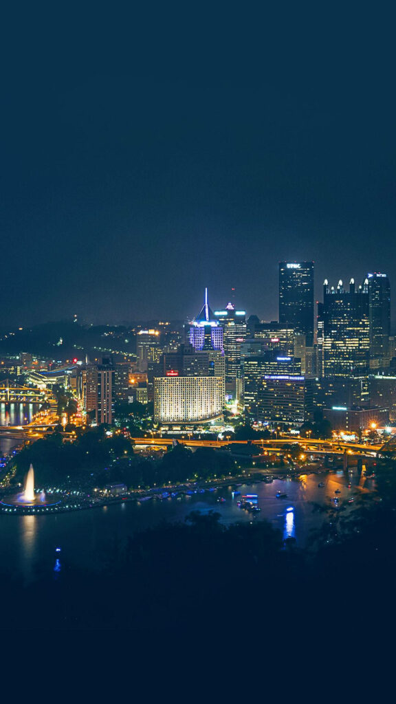Pittsburgh Nightscape: Illuminated City Skyline as Captivating Phone Wallpaper