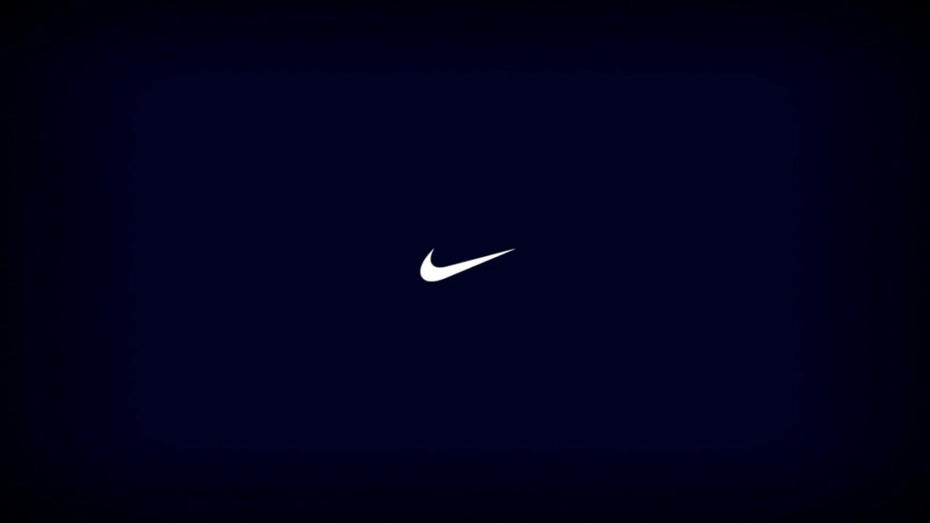 Nike's Blue Badge: A Stylish Showcase of Brand Loyalty Wallpaper
