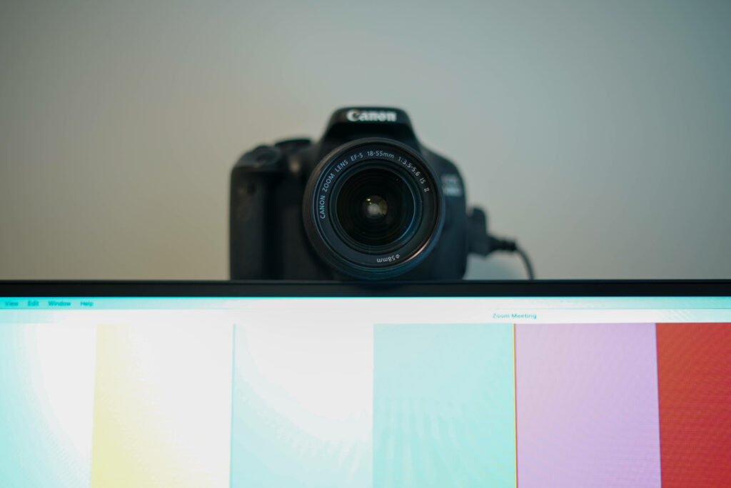Multi-functional Nikon DSLR as a Webcam: Stunning Image with Desktop Monitor in the Background Wallpaper
