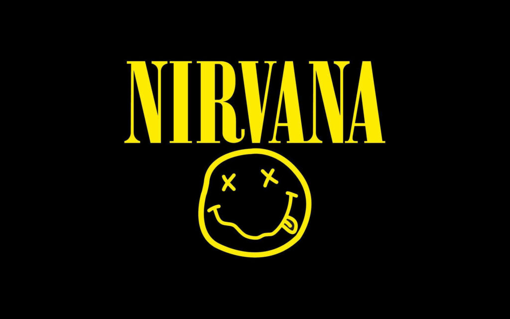 Playful Nirvana: Adorable Smiley Logo Graces Chic Black Wallpaper