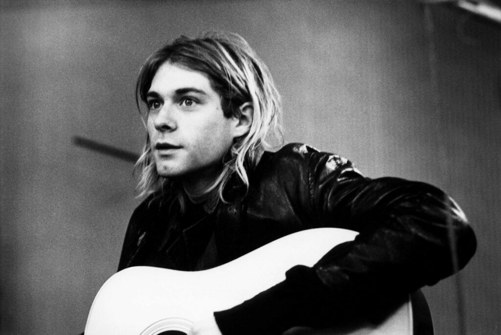 Legendary Rock Icon: Kurt Cobain and the Resounding Tunes of Nirvana Wallpaper