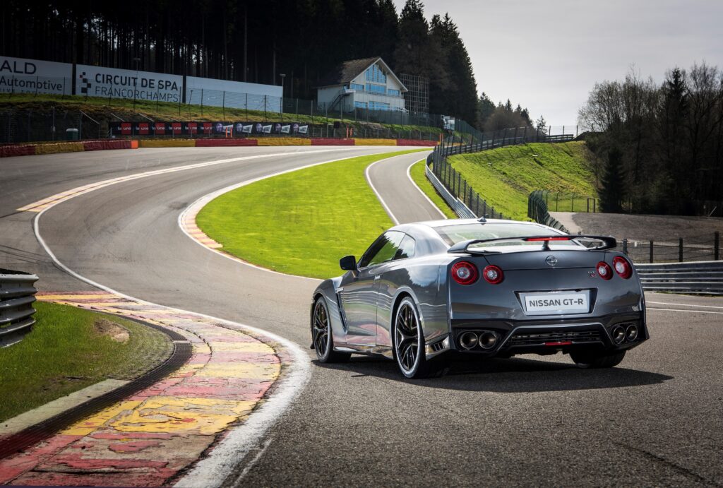Nissan GT-R Rear View on Scenic Racetrack - Stunning Wallpaper