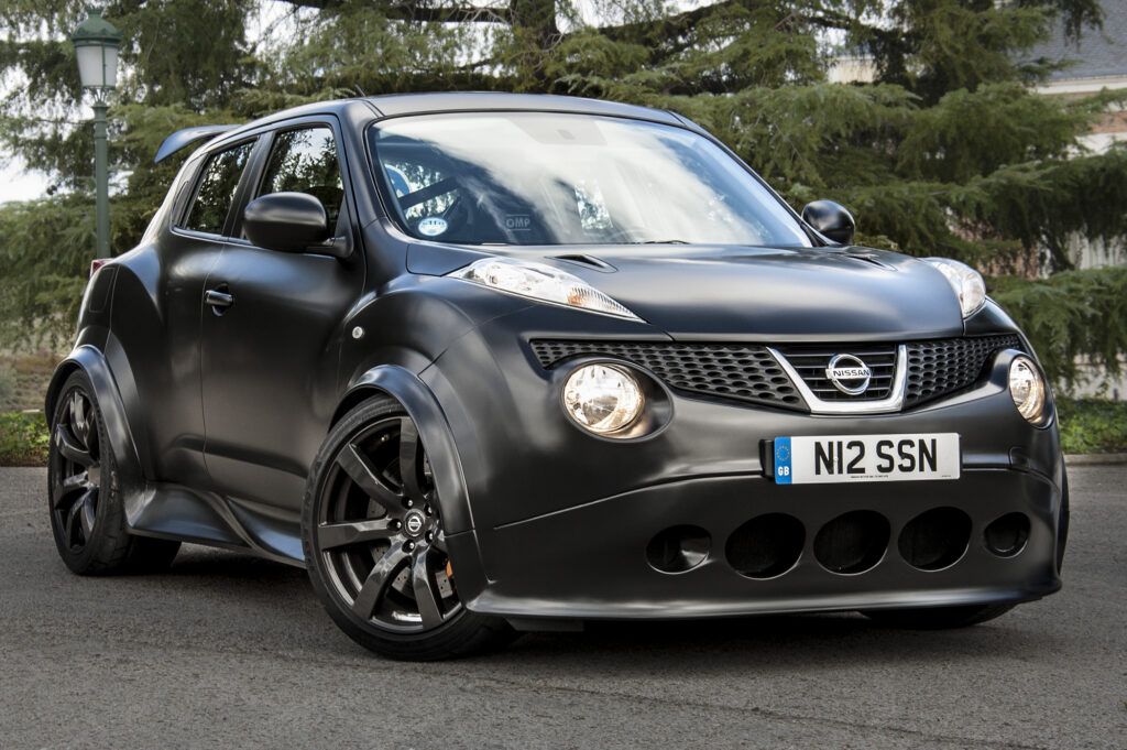 Stunning Nissan Juke R Wallpaper: Sleek Black Matte & Nismo Design