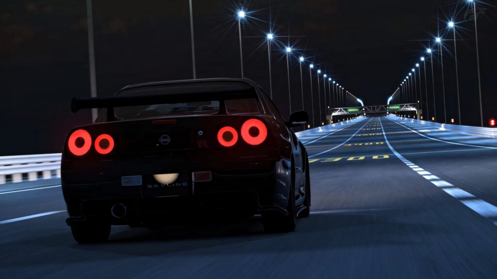 Night Drive: Nissan Skyline GT-R R34 Wallpaper - Speed & Thrill