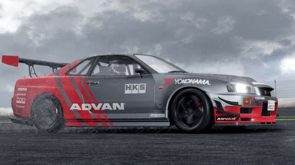 Nissan Skyline GT-R racing on wet track with rain effects and sponsor decals in Project Cars 2 Wallpaper
