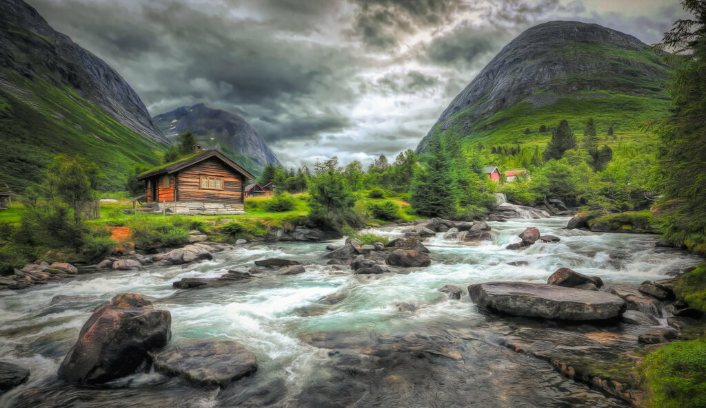 Picturesque Norwegian Mountain Landscape with a Charming Cabin by the River - HD Wallpaper