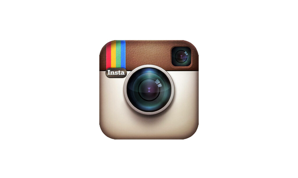 Nostalgic Instagram Icon: Vintage Camera with Rainbow Stripe Wallpaper