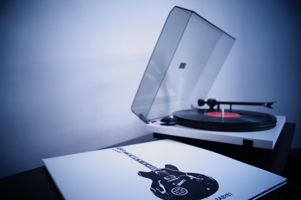 Nostalgic Vinyl Turntable Wallpaper for Music and Vintage Lovers