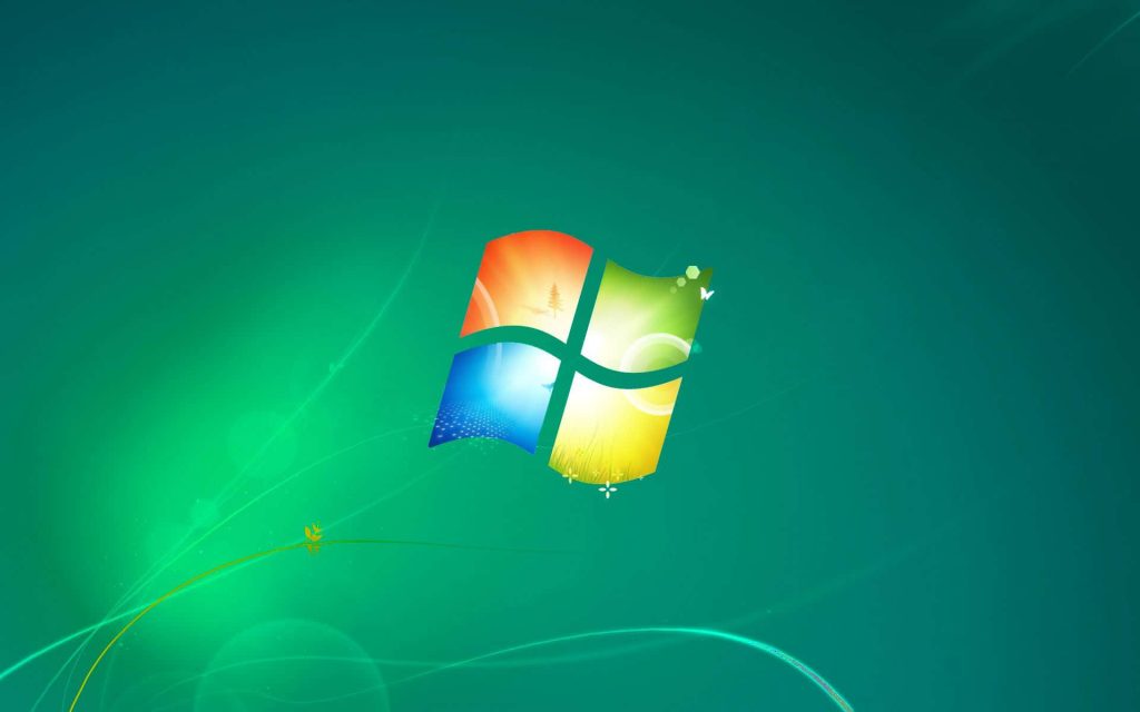 Windows 7 wallpaper with colorful four-pane logo on vibrant green gradient and abstract lines