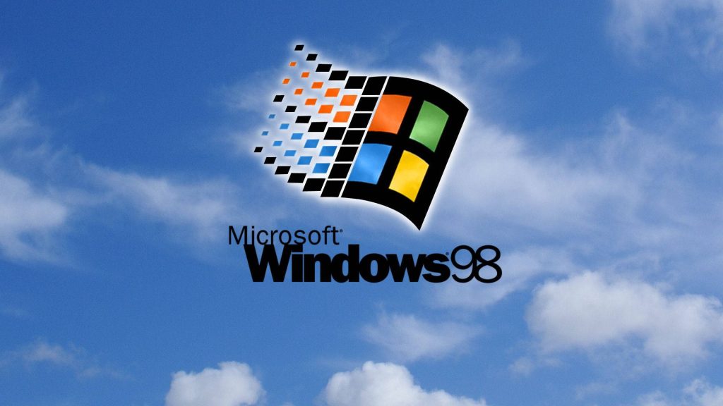 Microsoft Windows 98 wallpaper with colorful logo floating in bright blue sky with white clouds