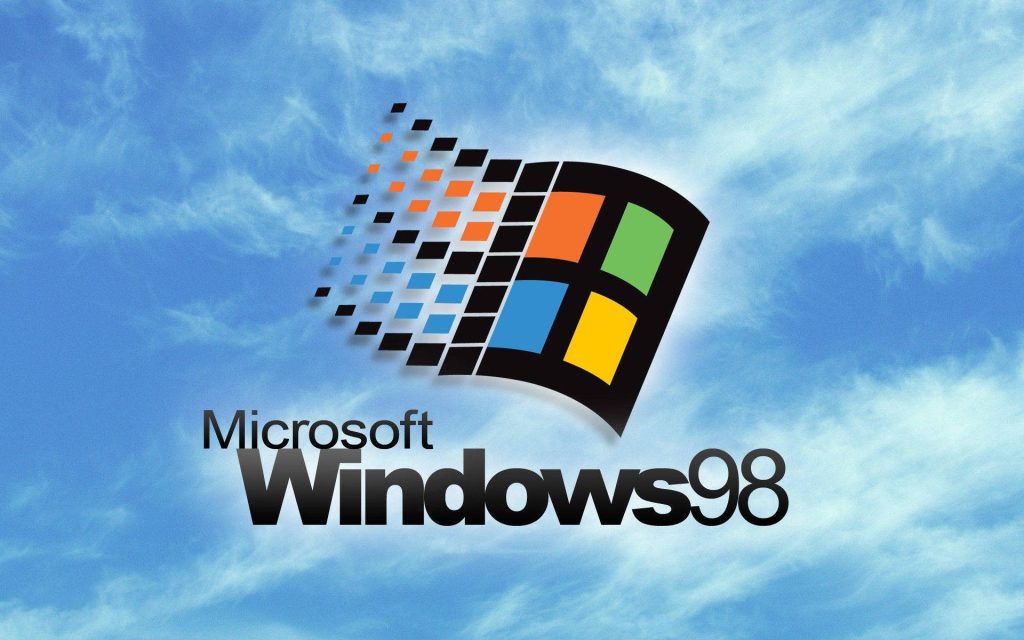 Windows 98 vintage wallpaper with classic colorful Microsoft logo on bright blue sky background
