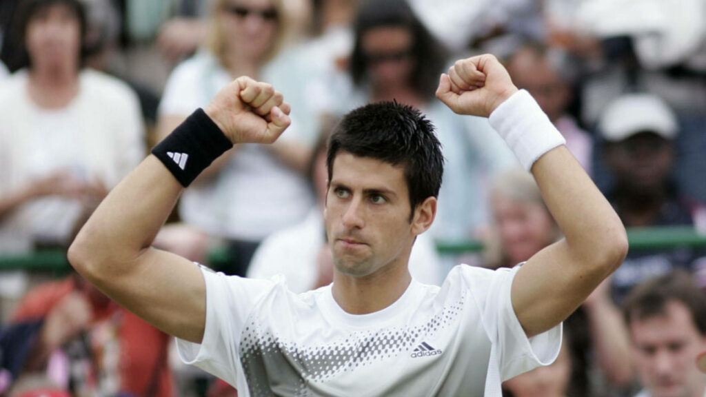 Victorious Novak Djokovic: A Passionate Sports Athlete Wallpaper