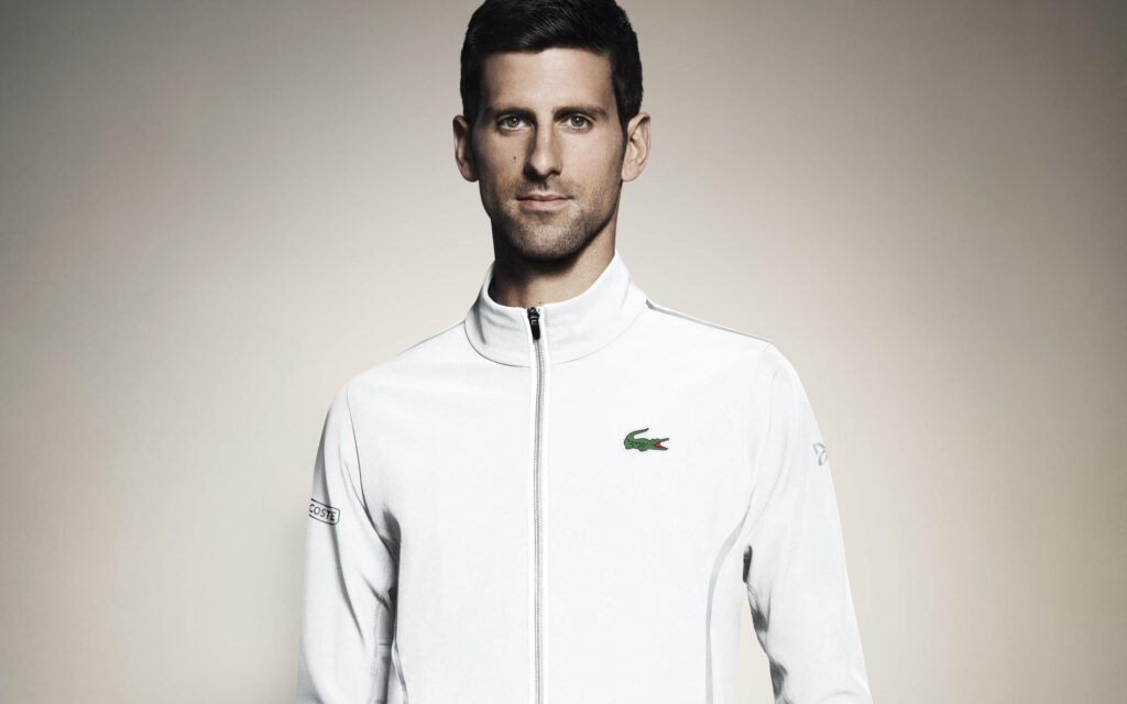 Novak Djokovic in Sleek White Lacoste Jacket - Wallpaper Background