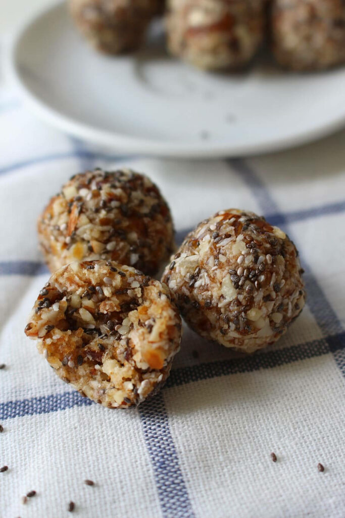 Nutrient-Rich Chia Seeds & Puffed Rice Balls on Striped Fabric Wallpaper