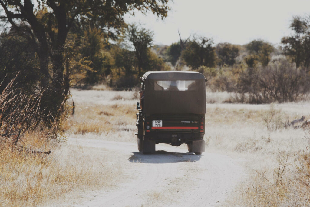 Off-road Adventure: The Impressive Black Jeep Truck in Action Wallpaper