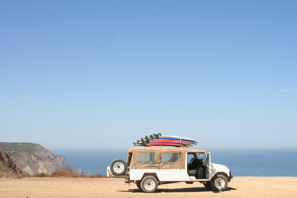 Chasing Waves and Escaping Reality: Embracing the Sun-Drenched Adventure Ahead Wallpaper