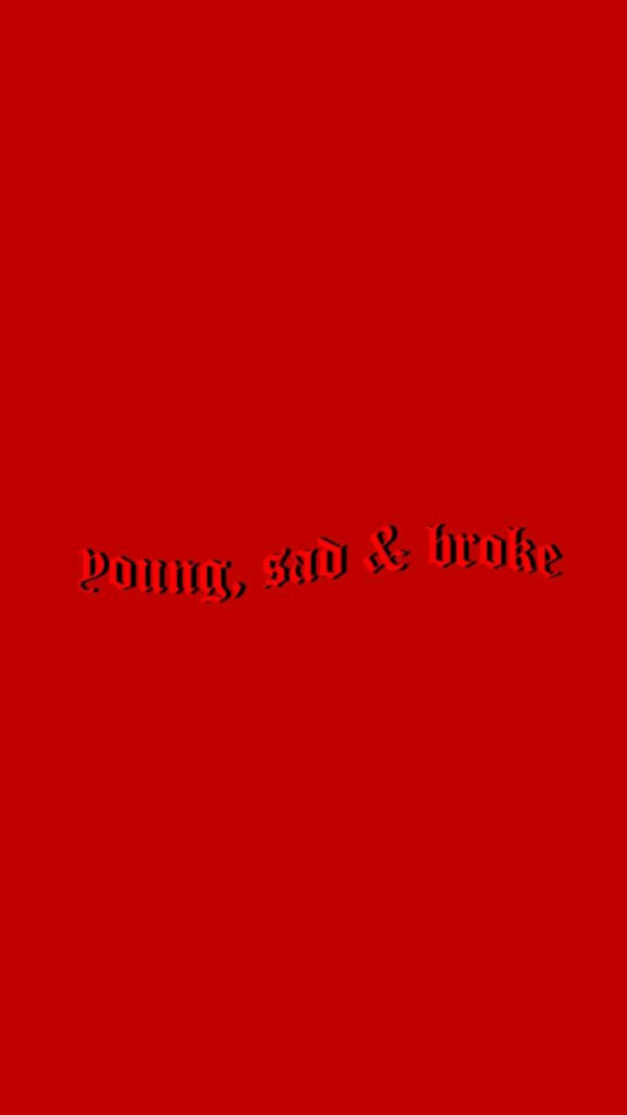 Youthful Desolation: A Minimalist Iphone Baddie Shot Featuring an Old English 'Young, Sad & Broke' Text on a Deep Red Background Wallpaper