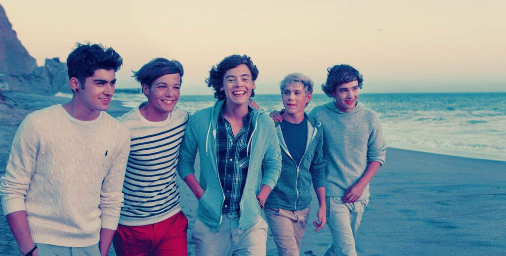 One Direction: Beach Conquerors in a Stylish Photo Wallpaper