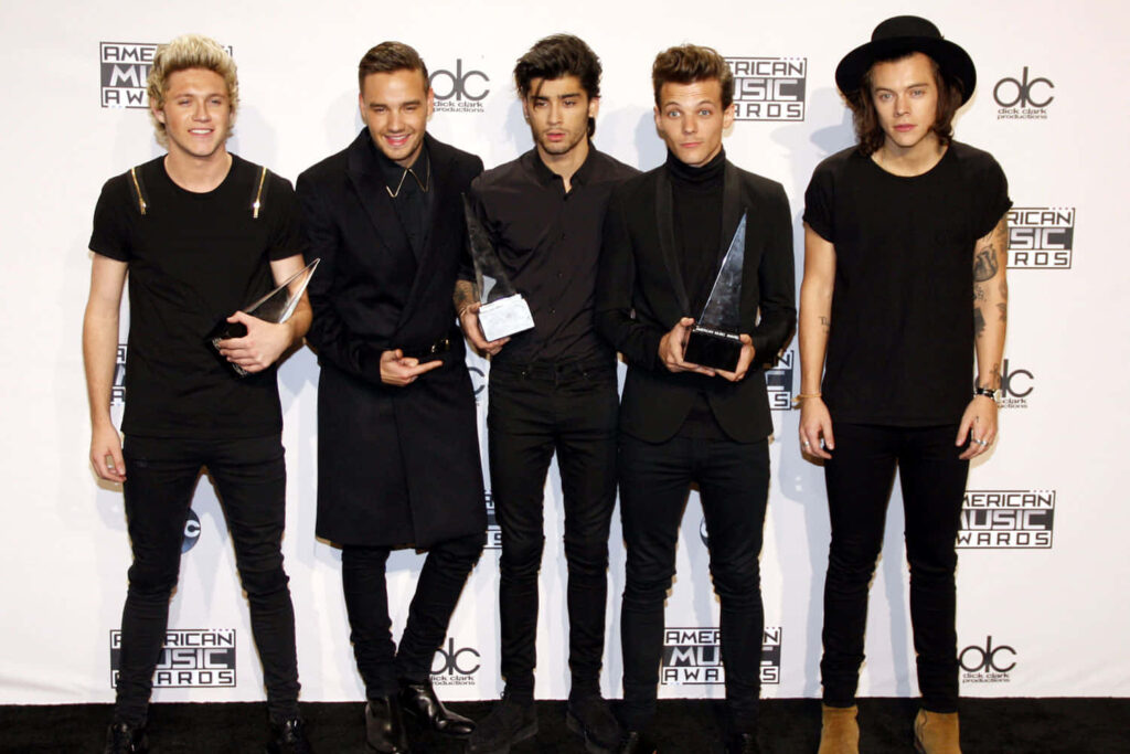 Happiness: One Direction's Delightful Unity Captured in Promotional Bliss Wallpaper