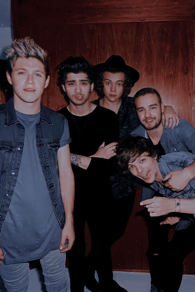 Goofy Bonded Boys of One Direction: Capturing the Spirited Camaraderie That Enthralled Fans Worldwide Wallpaper