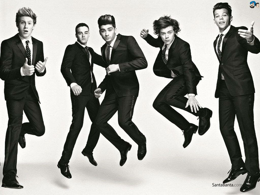 All Black Suited Sensation: One Direction's Legendary Lineup Takes the Stage! Wallpaper