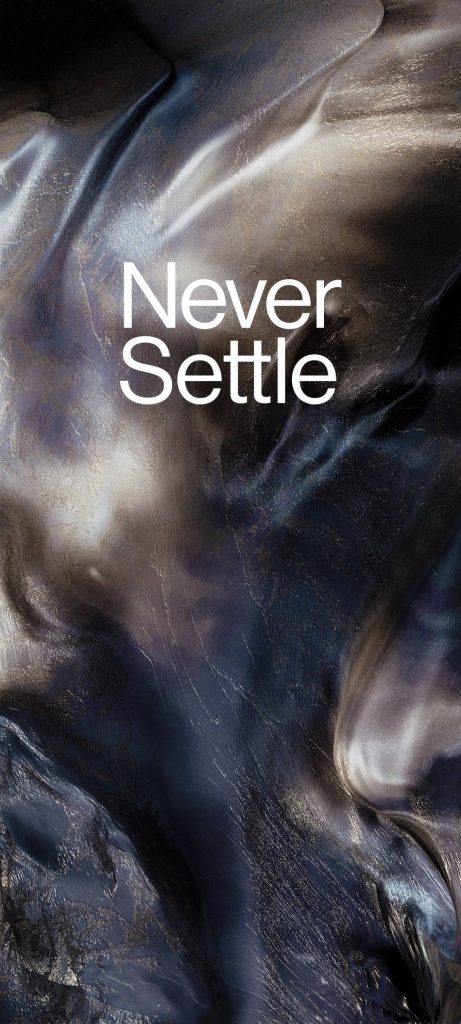 OnePlus Never Settle wallpaper with dark abstract metallic liquid marble texture and dramatic lighting