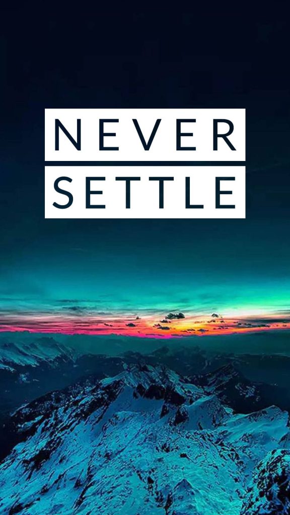 OnePlus Never Settle wallpaper with snow-capped mountains vibrant sunset and sleek white text
