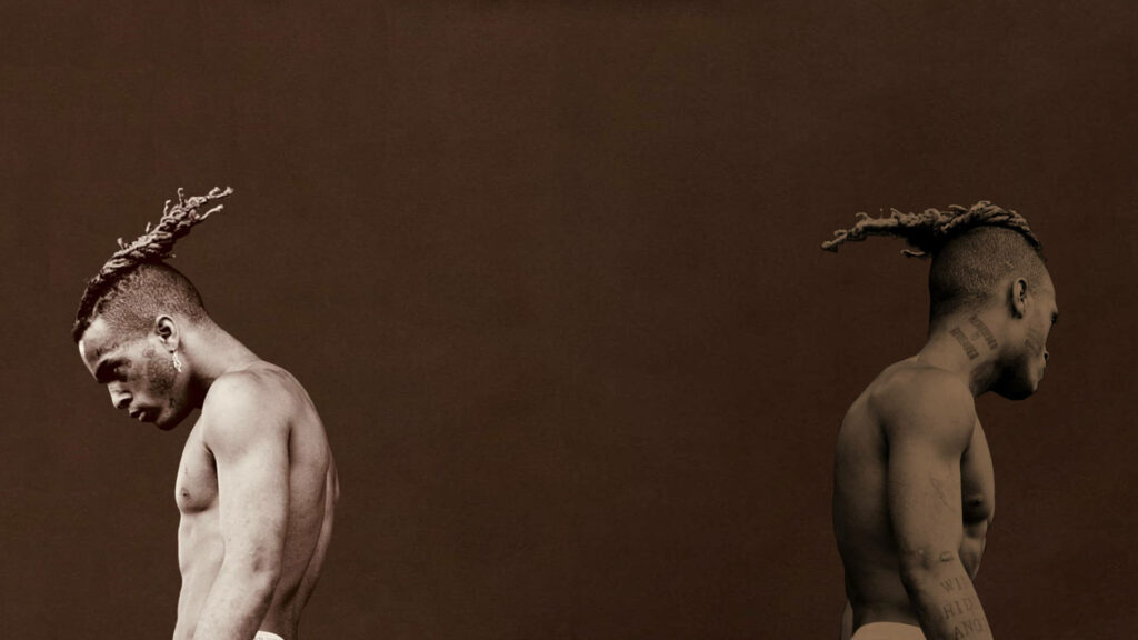 Opposing Duality: A Vintage Desktop Wallpaper Featuring Xxxtentacion in Sepia Tones