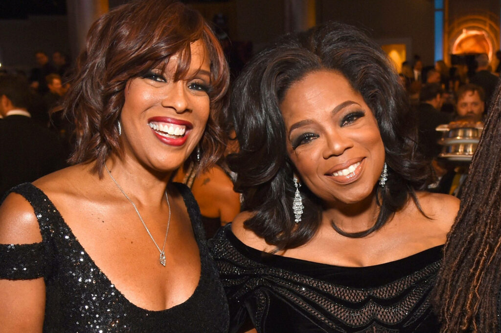 Oprah Winfrey & Friend: Smiling Together - Warm Wallpaper Background