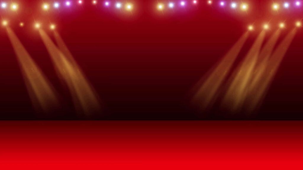 Brilliantly Lit: A Fiery Red Stage with a Powerful Orange Spotlight Background Wallpaper