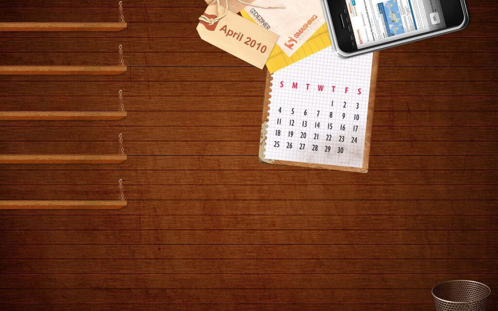 Organized workspace wallpaper with wood texture calendar smartphone ticket notepad warm tones