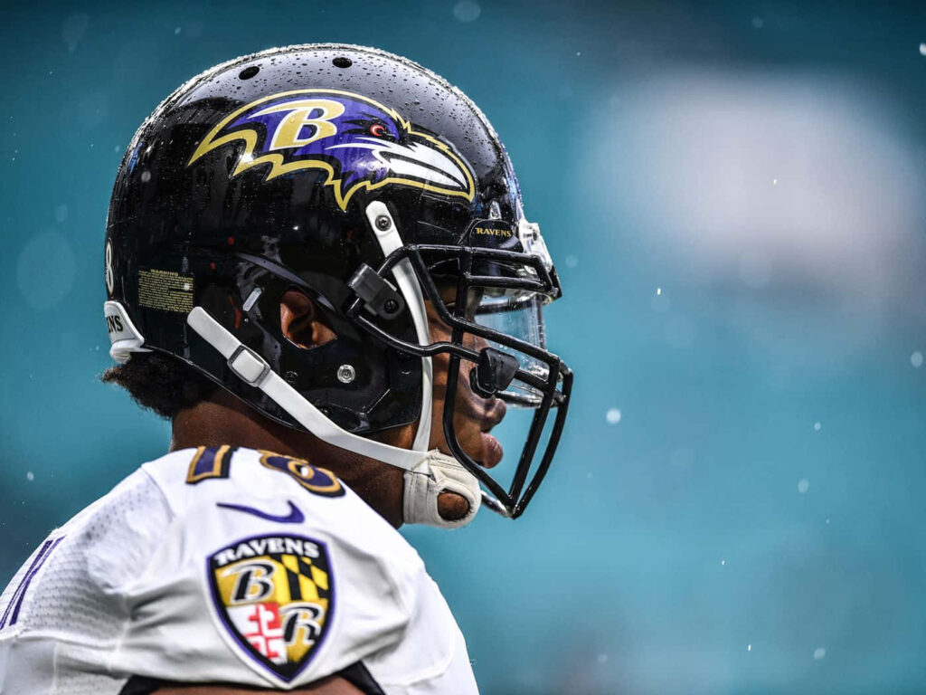 Orlando Brown Jr Baltimore Ravens NFL player focused on field dynamic wallpaper background