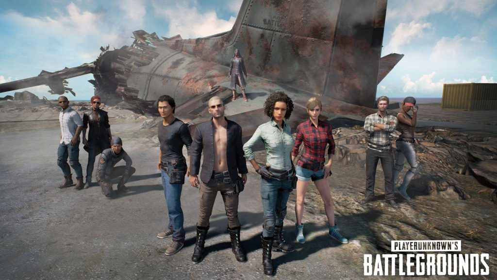 PUBG wallpaper with diverse survivors by rusted crashed plane on desolate battle royale map