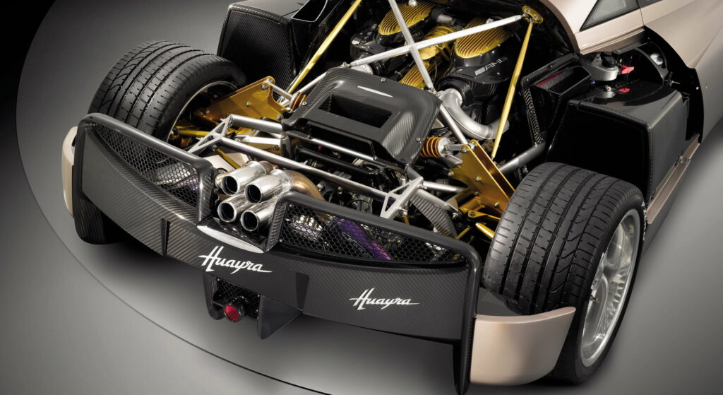 Power Unleashed: Captivating HD Wallpaper of Pagani Huayra's Exquisite Engine in Action