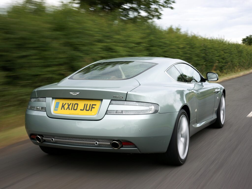 2010 Aston Martin DB9 Wallpaper - Pale Blue Elegance in Nature