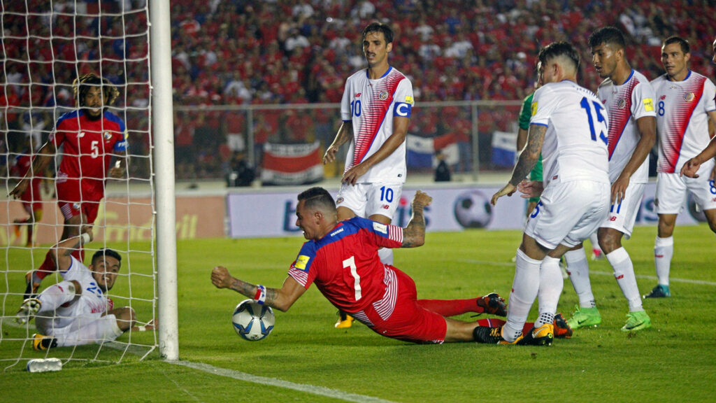 Intense 2018 FIFA World Cup qualifier action Panama vs Costa Rica players battling near goal Wallpaper