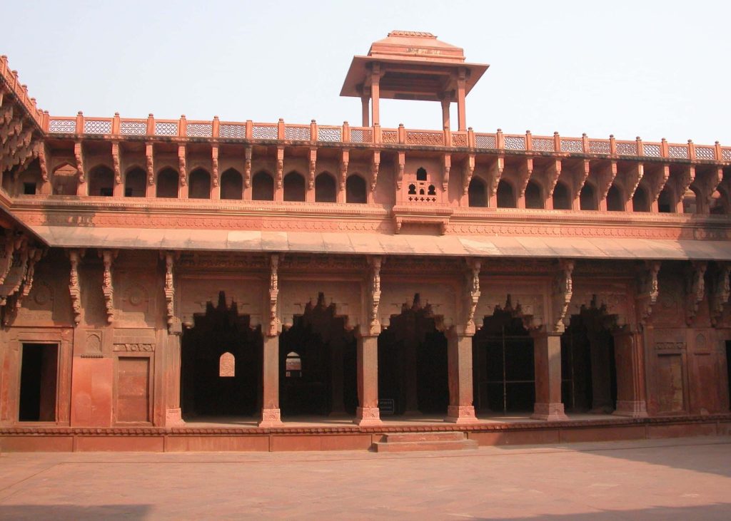 Panch Mahal Fatehpur Sikri red sandstone Mughal arches rooftop chhatri bright sunlight Wallpaper