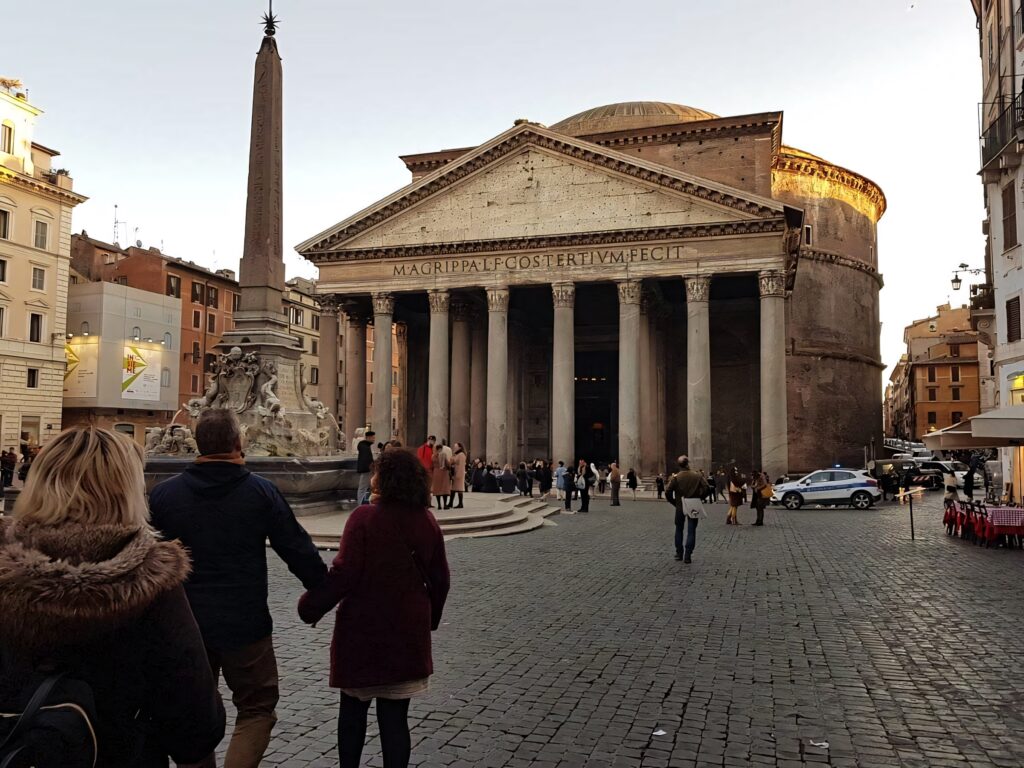 Pantheon Rome sunset with ancient columns warm light historic architecture lively square wallpaper