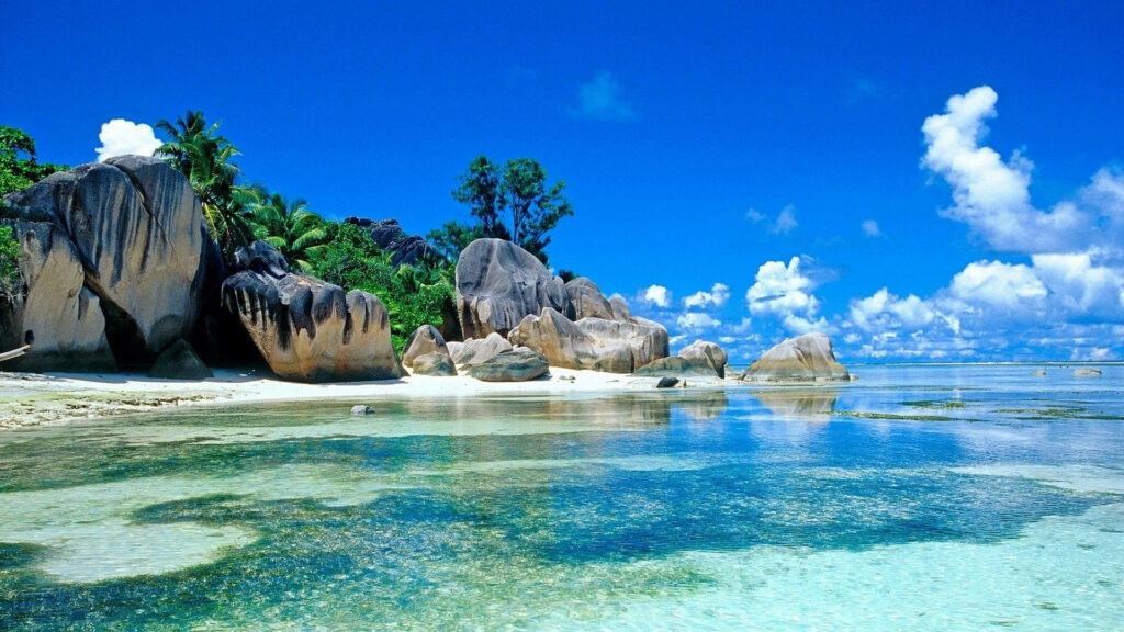 Serene Paradise: Seychelles Beach - Mesmerizing Screen Saver for a Tranquil Escape Wallpaper