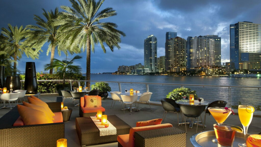Palm Paradise: Indulge in Dining Delights with a Stunning Ocean View Wallpaper