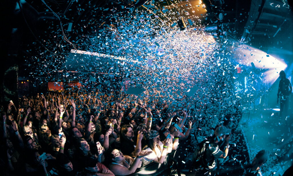 Vibrant Celebration: A Dynamic Gathering in HD Wallpaper