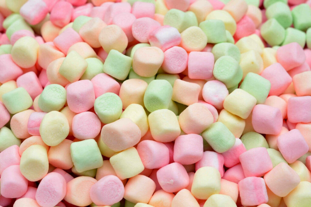 Colorful 3D pastel marshmallows wallpaper with soft playful texture for cheerful backgrounds