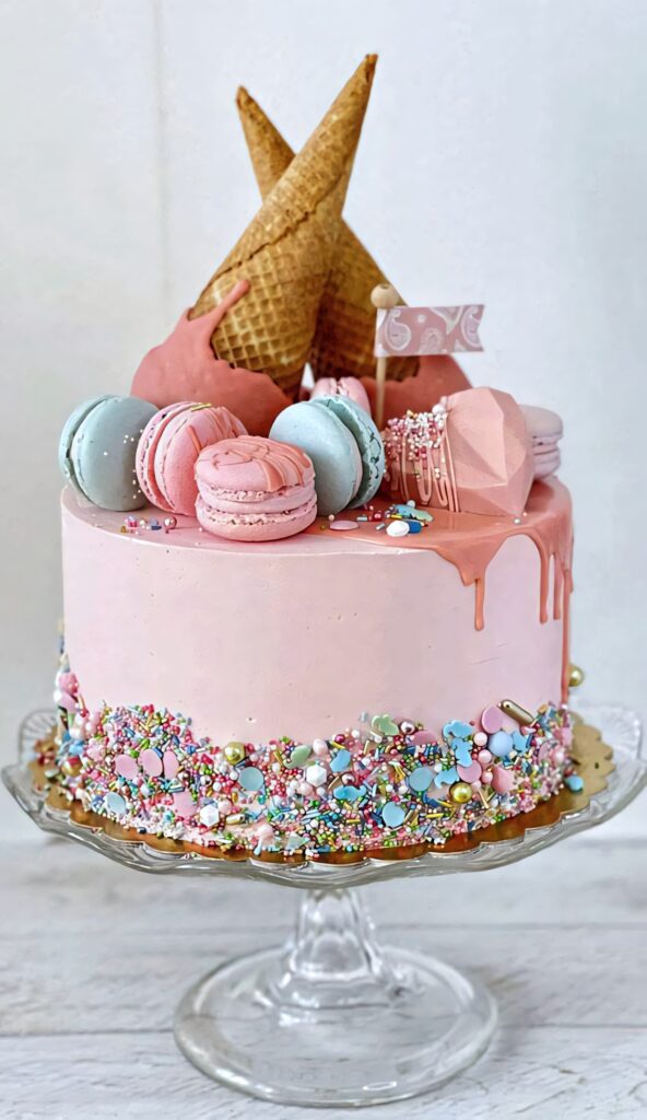 Whimsical Pastel Birthday Cake Wallpaper with Macarons & Sprinkles