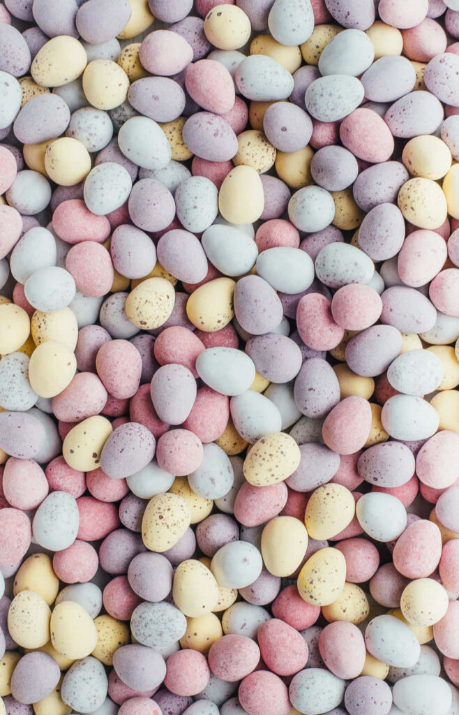 Pastel candy rocks wallpaper in pink lavender yellow and blue for a cheerful colorful background