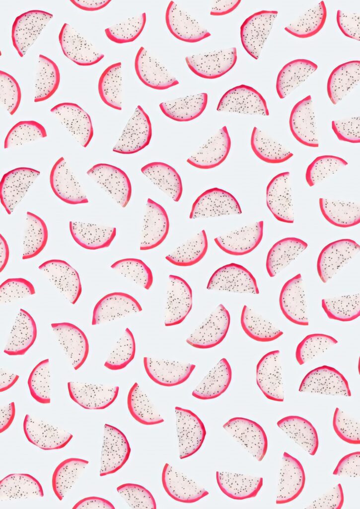 Pastel dragonfruit pattern wallpaper with vibrant pink slices on white background for decor