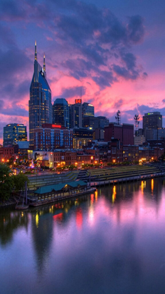 Nashville Serenity: Mesmerizing Cityscape Blissfully Reflected on Nashville Riverfront in Pastel Hues Wallpaper